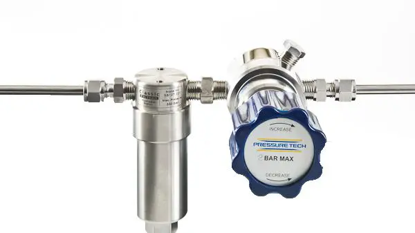 Protecting a pressure regulator with a coalescing filter
